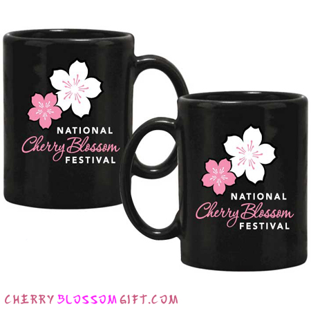 The National Cherry Blossom Festival coffee mugs are black and emblazoned